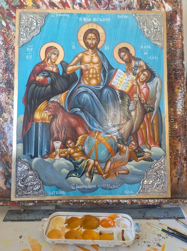 Orthodox Christian religious icon with central figure of Jesus surrounded by saints and cherubs on cloud, with decorative silver borders