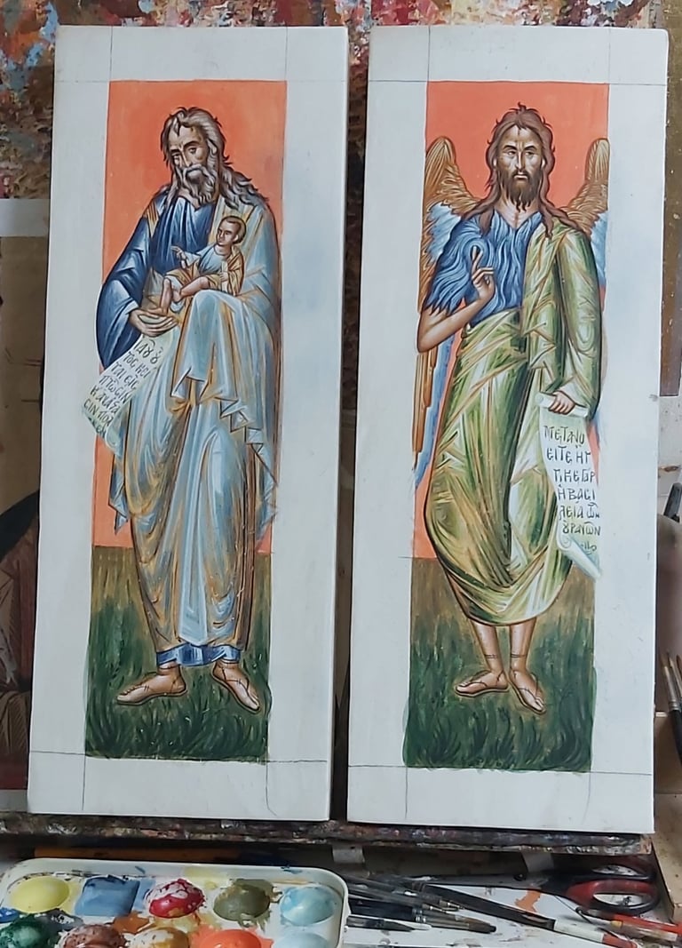 Two religious icon illustrations featuring bearded saints in traditional robes with orange backgrounds, displayed as artistic studies with watercolor palette below