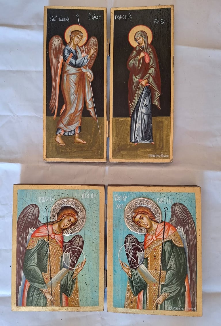 Four religious icon paintings arranged in two rows, featuring Orthodox Christian angels and saints with halos on wooden panels with gold and colored backgrounds