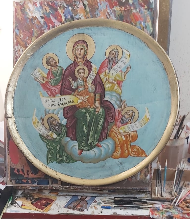 Orthodox religious icon depicting Virgin Mary with child Jesus surrounded by four saints with halos on light blue circular background