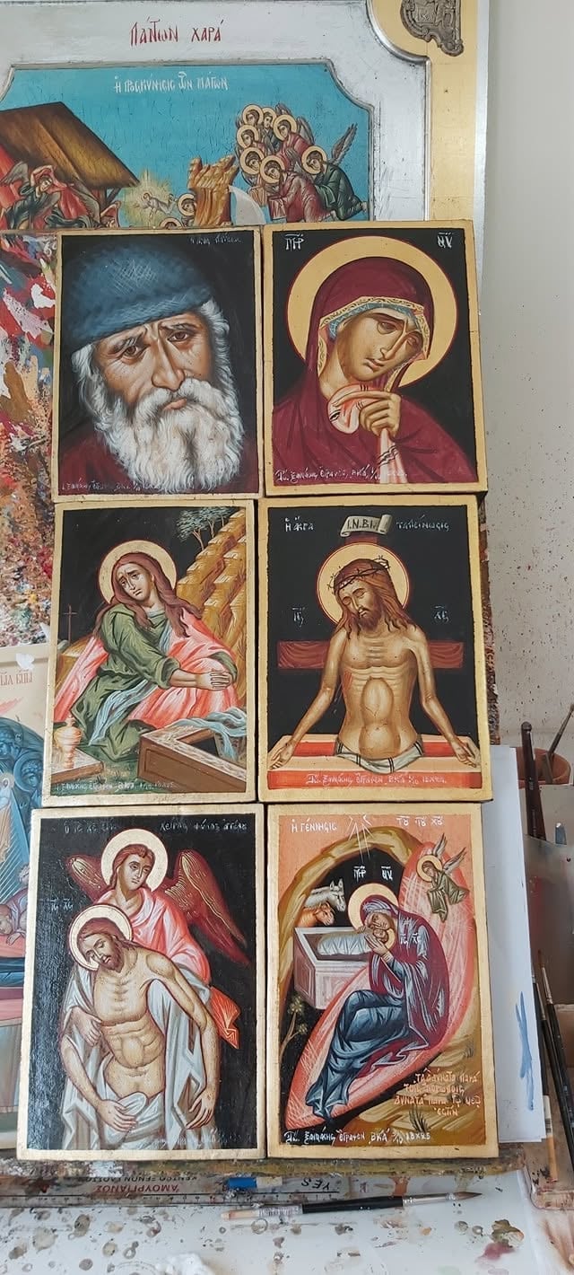 Collection of six Eastern Orthodox religious icons arranged in a grid, featuring painted saints with gold halos and Cyrillic text on dark backgrounds