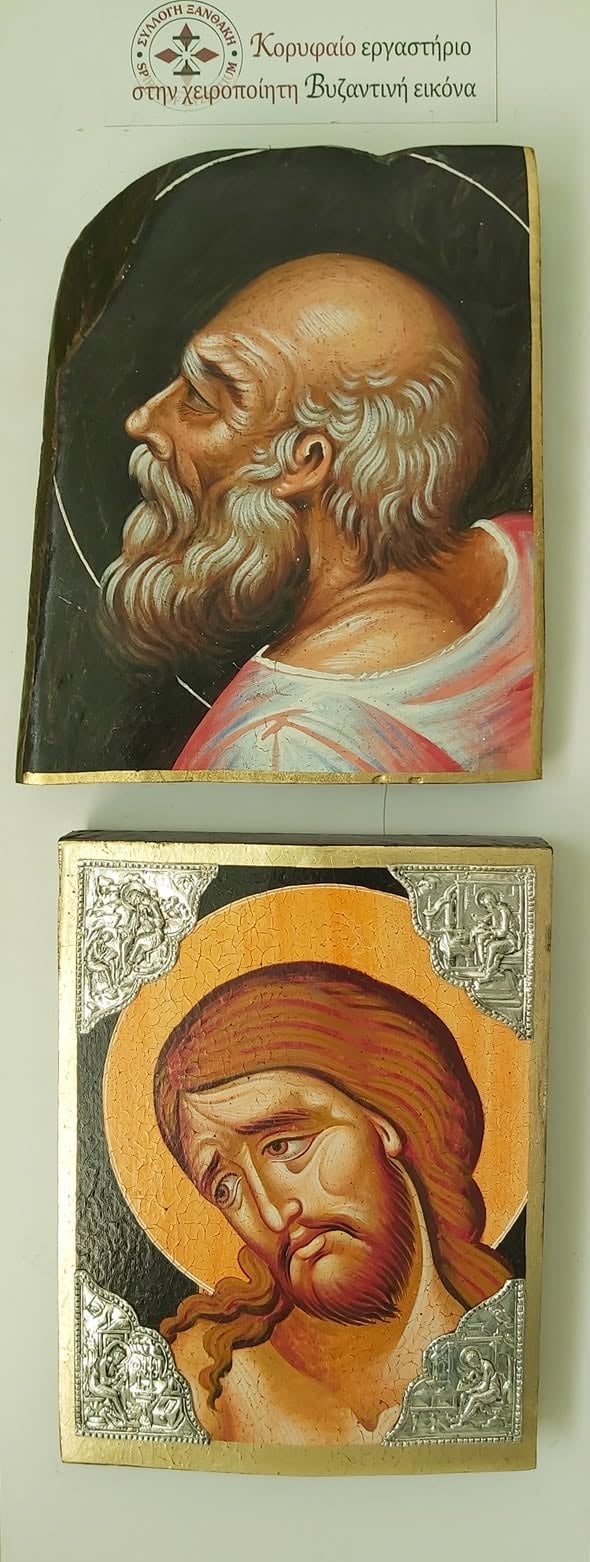 Two Byzantine religious icons painted on wood panels depicting bearded male saints with halos and traditional iconographic details