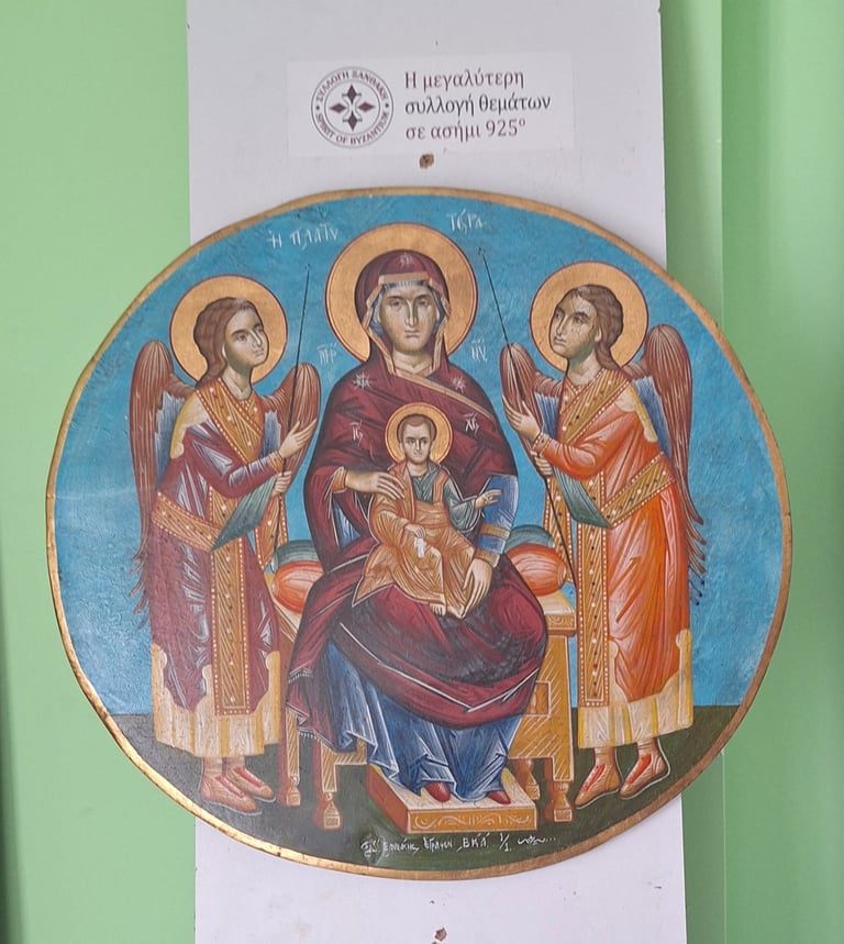 Byzantine religious icon depicting Virgin Mary holding Christ child in center, flanked by two angels, painted in gold, blue, red and orange hues on circular panel