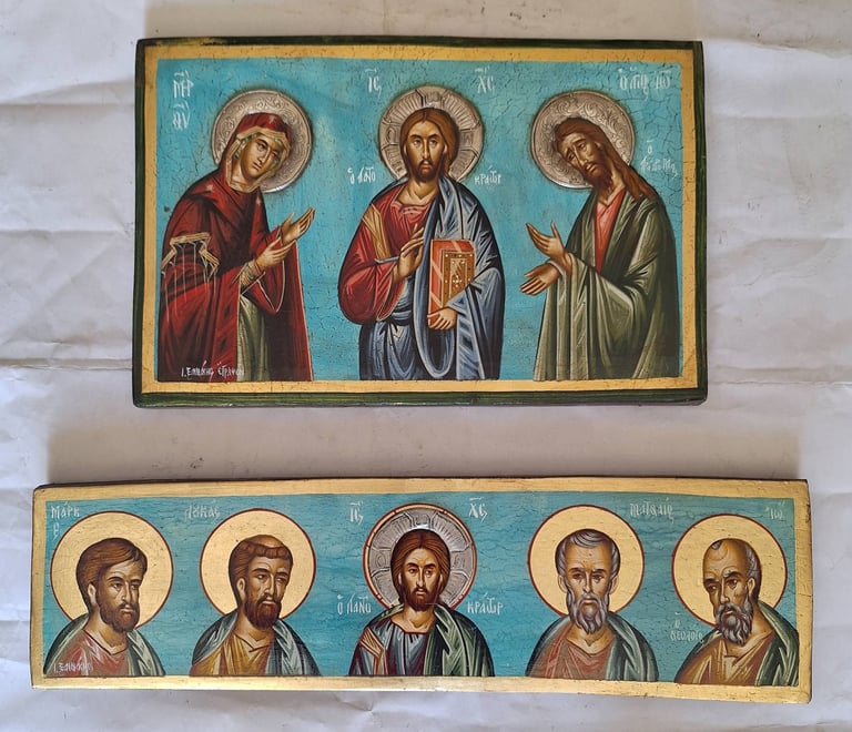 Two Byzantine-style religious icons featuring holy figures with halos against gold and blue backgrounds